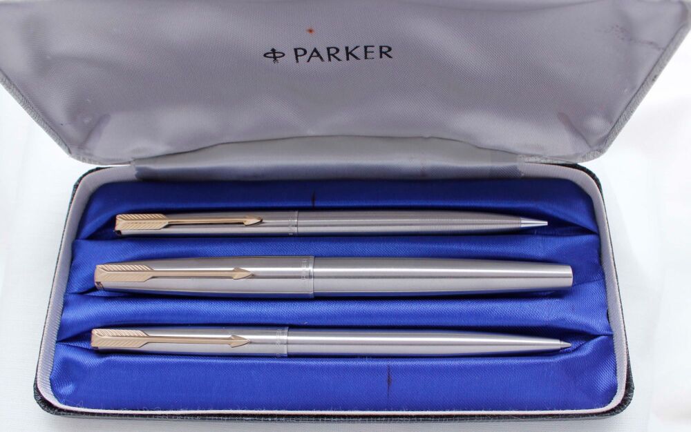 3933 Parker 61 Flighter Triple Set in Brushed Steel with Gold trim. Mint an