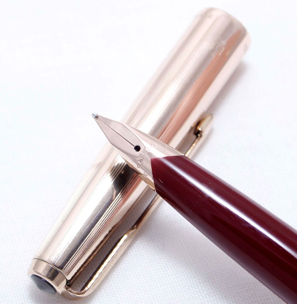 4050 Parker 65 in Burgundy with a Rolled Gold Cap. Smooth Medium FIVE STAR Nib.