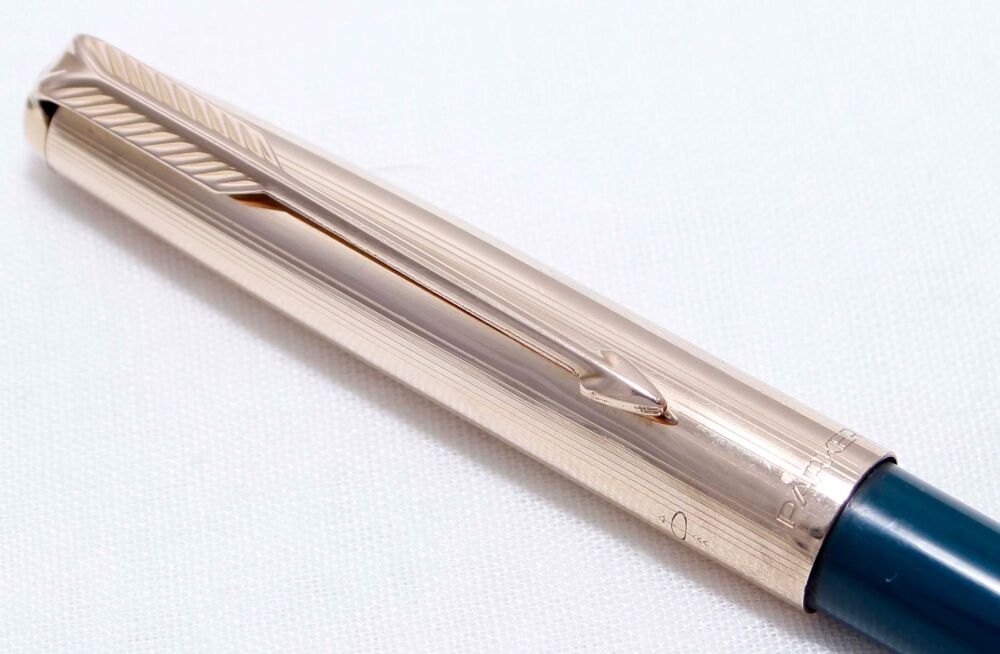 4253 Parker 61/65 Ball Pen in Teal Blue with a Rolled Gold Cap.