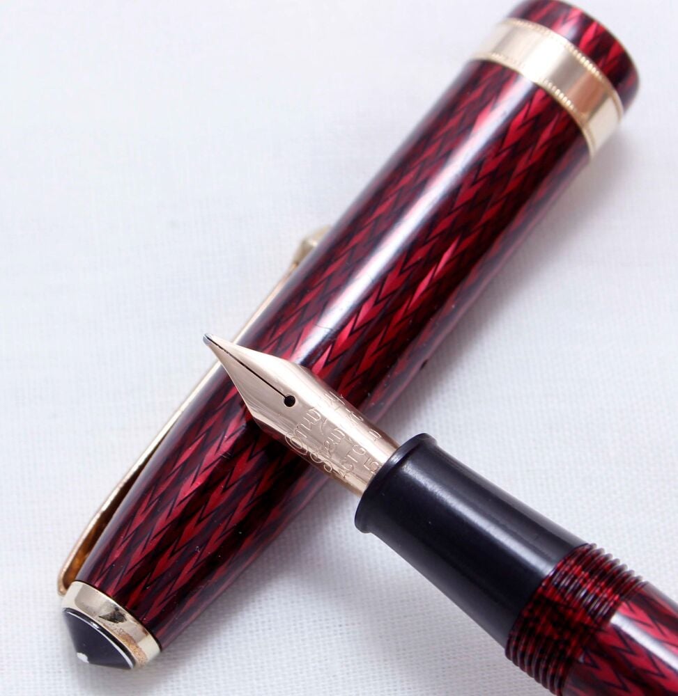 4387 Conway Stewart No.76 in Red Herringbone. Smooth Medium FIVE STAR Nib. Mint and Boxed.