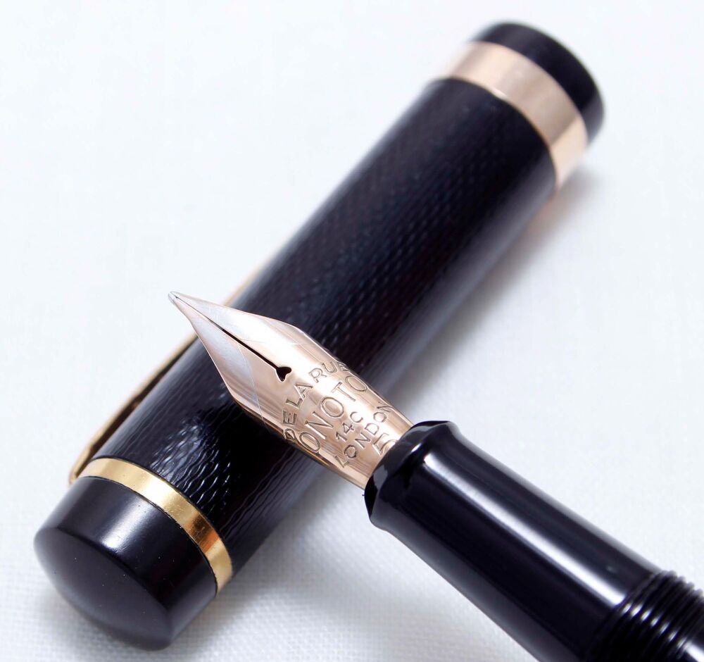 4447 Onoto "The Pen" in Black Chased Hard Rubber. 18ct gold band, Superb Fine Flex FIVE STAR Nib.