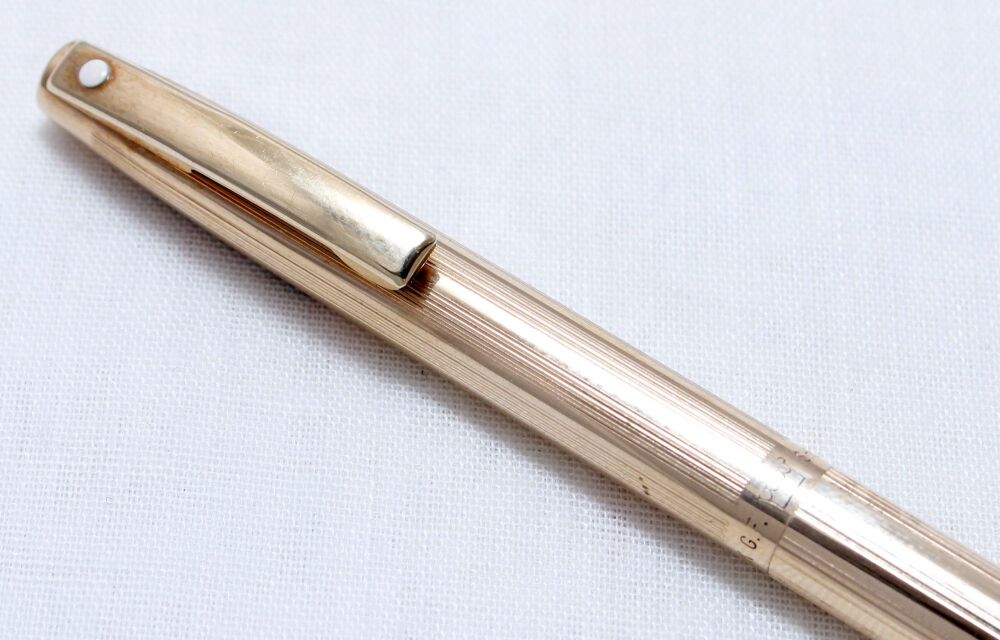 4455 Sheaffer Lady 777 Pencil in Gold Plate with a lined pattern.