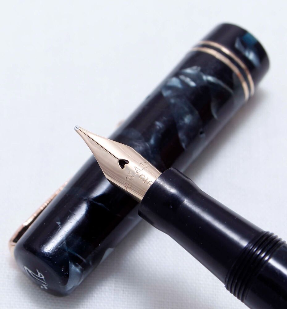 4456 Swan (Mabie Todd) Self Filler in Blue Marble. Broad side of Fine Megaf