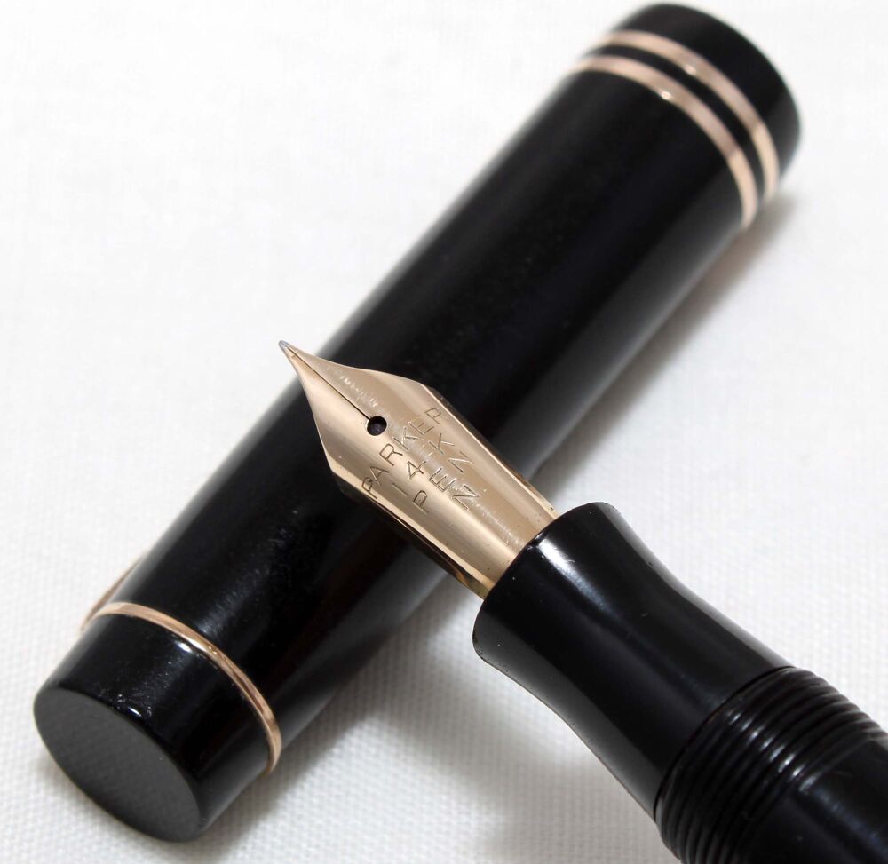 4549 Parker Duofold Junior Streamlined Fountain Pen in Classic Black. c1937. Medium FIVE STAR Nib.
