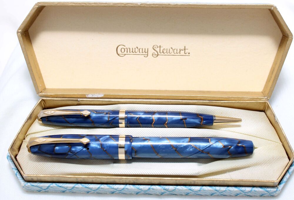 4586 Conway Stewart No.84 Fountain Pen and Propelling Pencil Set in Gold Veined Blue Marble, Fine side of Medium FIVE STAR nib. Mint and Boxed.