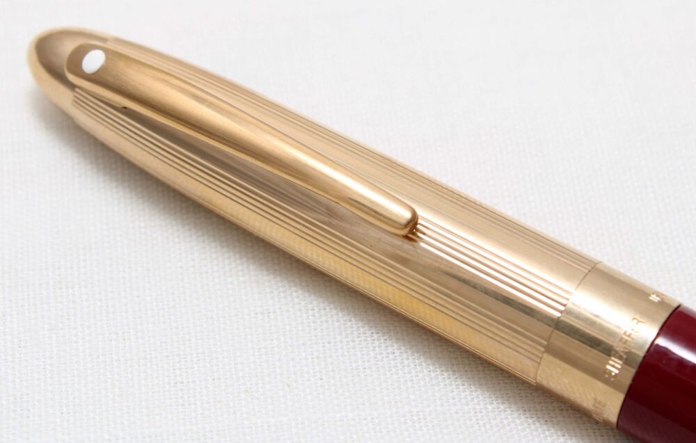 4672 Sheaffer Crest 592 Red Laque and Gold plated Ball Pen. Mint and unused.