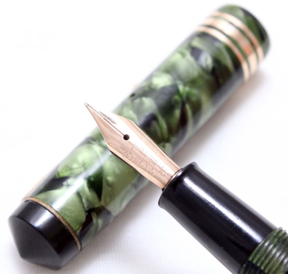 4821 Conway Stewart No.388 in Green Marble. Medium FIVE STAR Nib.