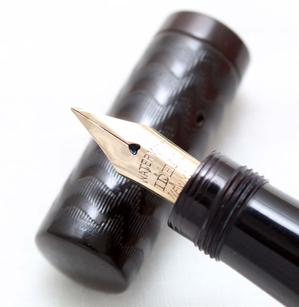 4906. Early Watermans No.12.S Safety Pen in Black Chased Hard Rubber. Magni