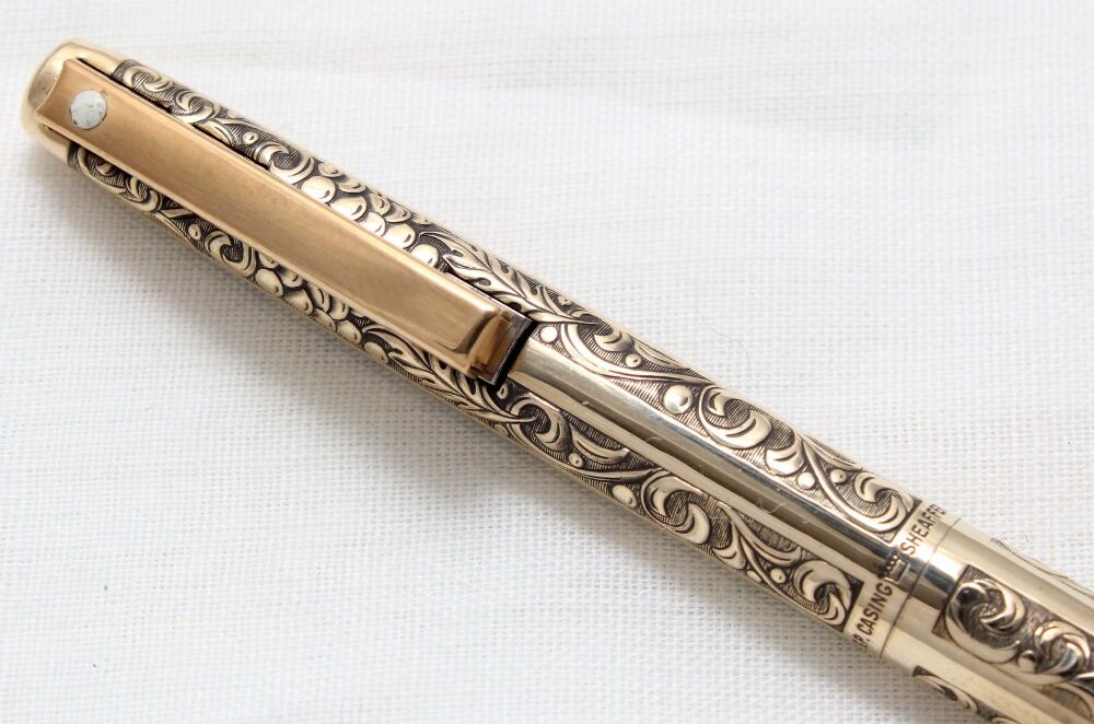 5033 Sheaffer Imperial Gold Plated Ball Pen in the Grape and Leaves pattern.