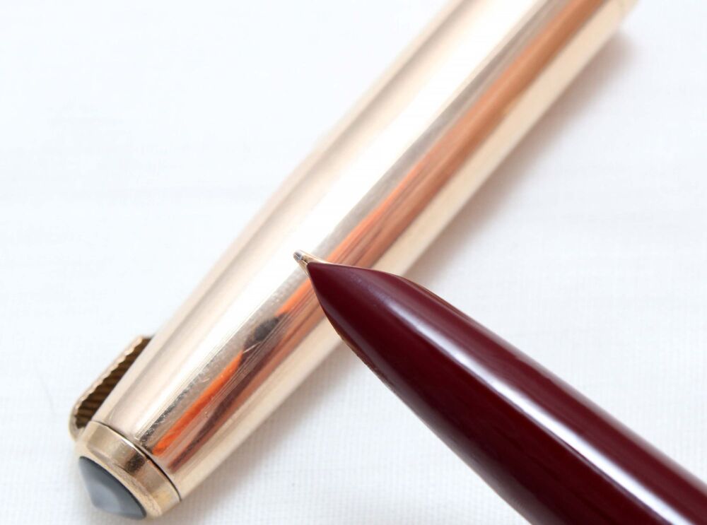 5059. Parker 51 Aerometric in Burgundy with a Rolled Gold Cap, Smooth Medium Nib.