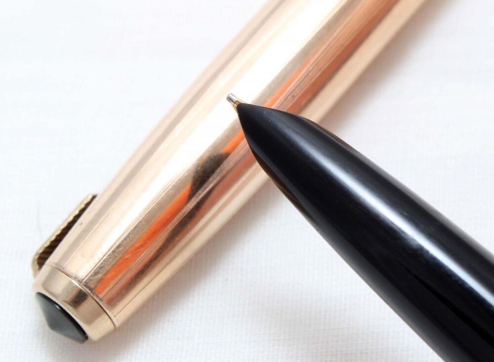 5058 Parker 51 Aerometric in Black with a Rolled Gold Cap. Smooth Broad side of Medium FIVE STAR Nib.