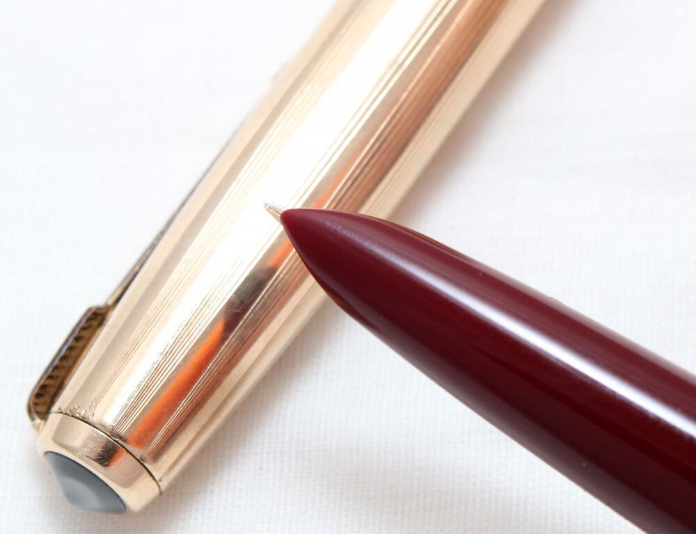 5064. Parker 51 Aerometric in Burgundy with a Rolled Gold Cap, Smooth Fine side of Medium Nib.