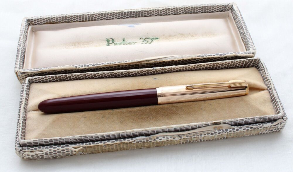 5086. Superb Parker 51 Aerometric in Burgundy with a Rolled Gold Cap, Smooth Medium Nib. Mint and Boxed.
