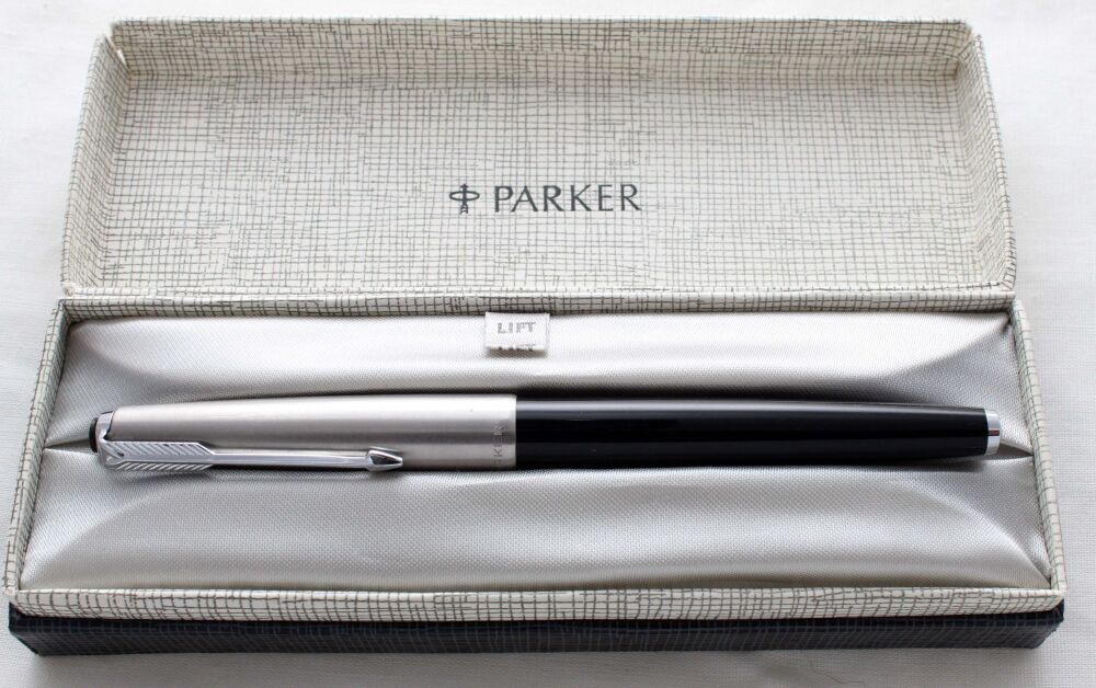 5286 Parker 65 in Black with a Lustraloy cap. Medium FIVE STAR Nib. Mint and Boxed.