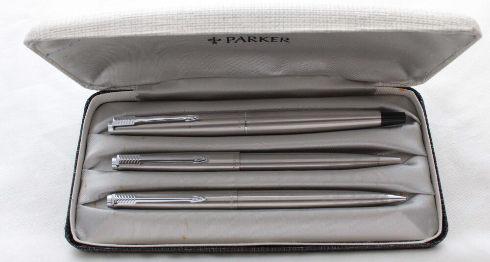 5291 Parker 45 Flighter Triple Set in Brushed Steel with Gold trim. Mint and Boxed. Medium Nib.