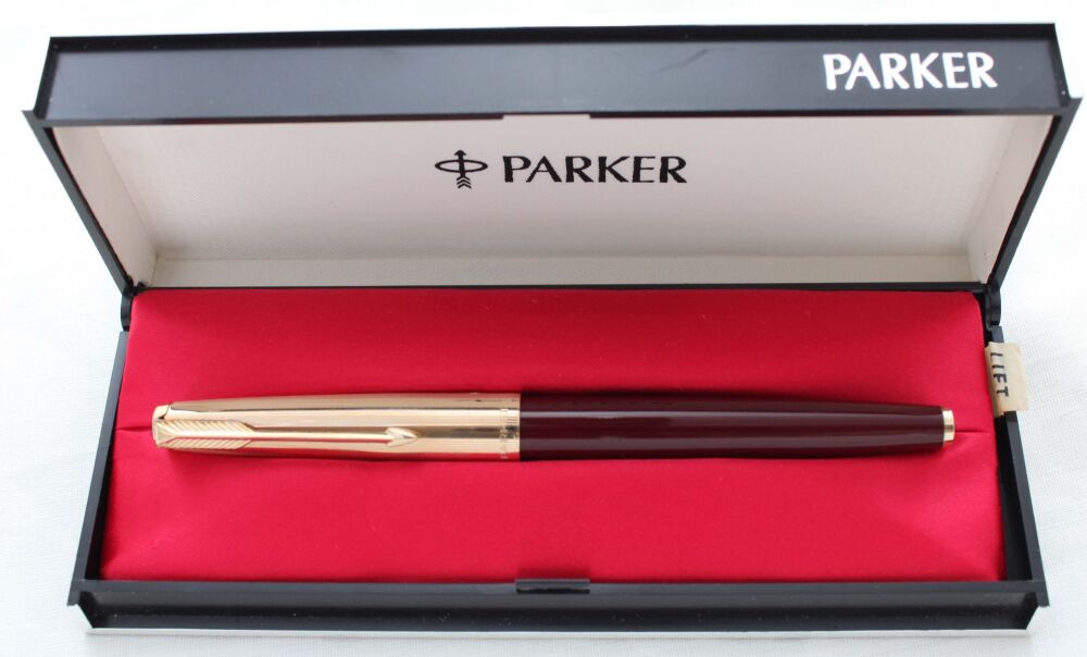 5322 Parker 65 in Burgundy with a Rolled Gold cap. Medium FIVE STAR Nib. Mint and Boxed.