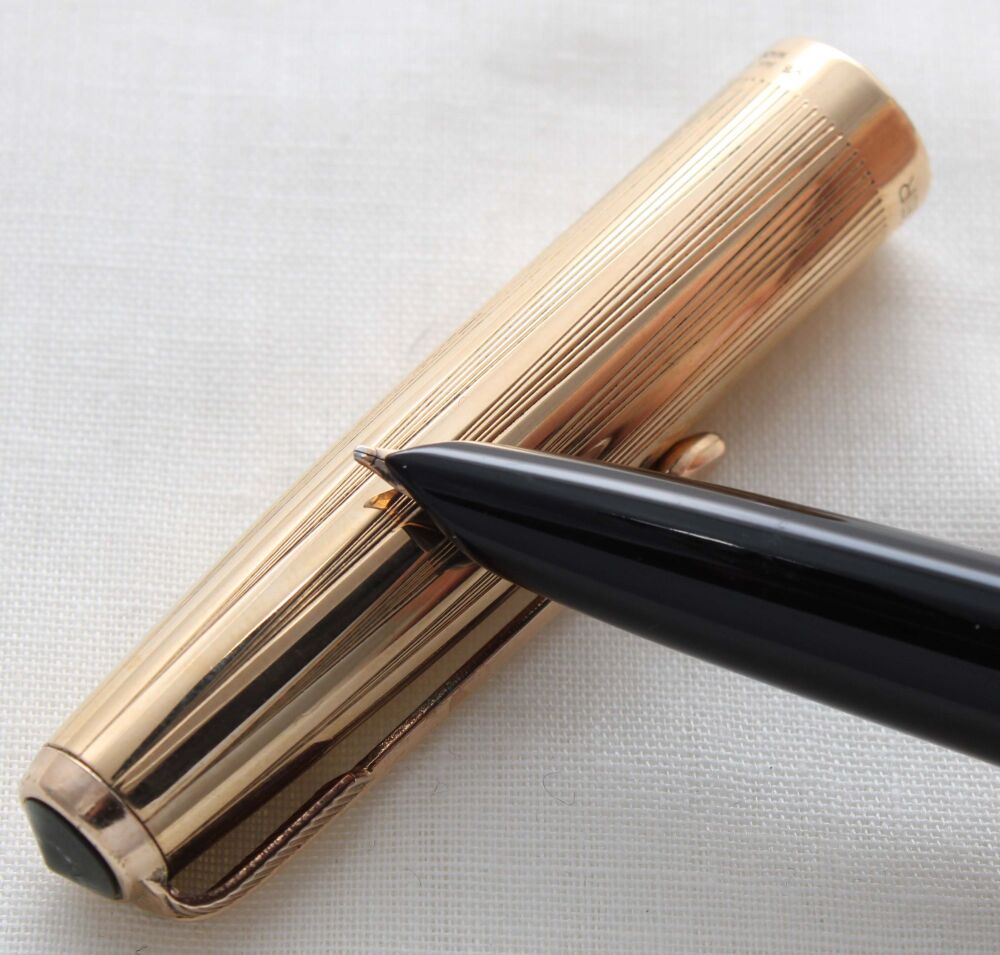 5204 Parker 51 Aerometric in Black with a Rolled Gold Cap. Broad FIVE STAR Nib.
