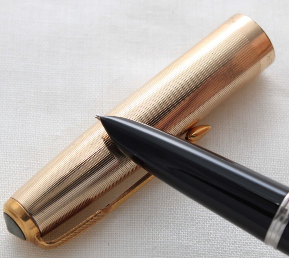 5203 Parker 51 Aerometric in Black with a Rolled Gold Cap. Medium Oblique Italic FIVE STAR Nib.
