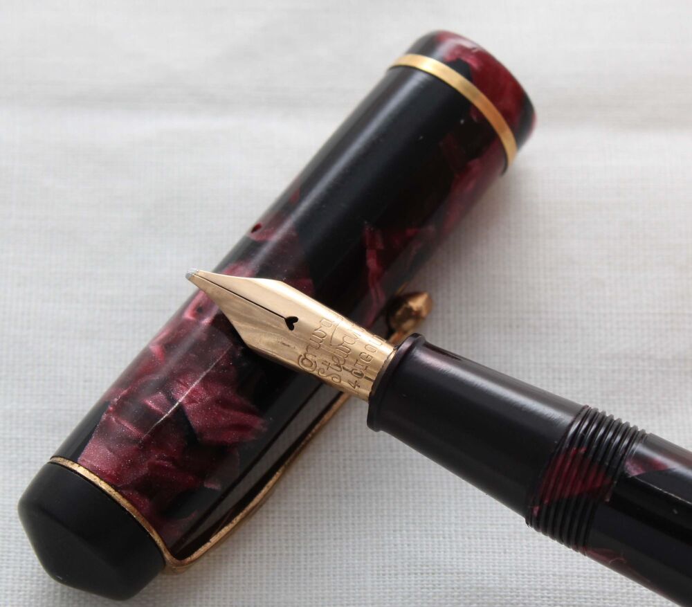 5230 Conway Stewart No.286 in Burgundy Marble. Medium Italic FIVE STAR Nib.