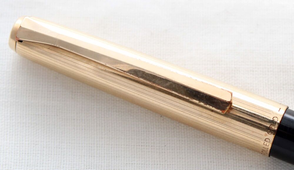 5267 Pelikan M30 Ball Pen in Black with a Rolled Gold Cap.