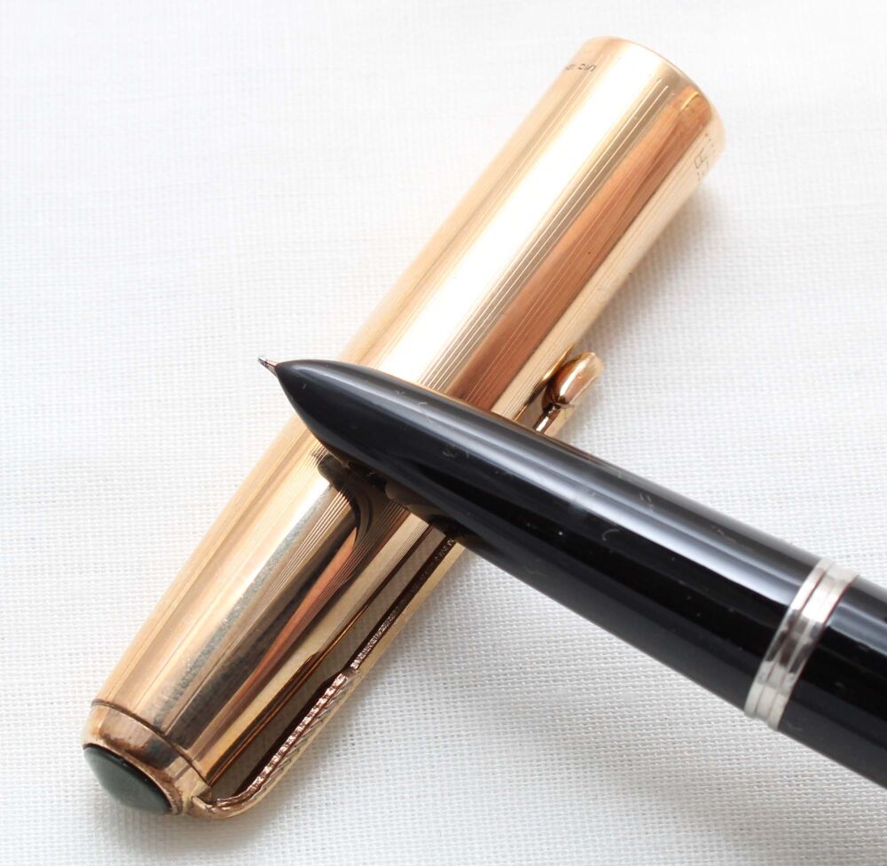 5422M Parker 51 Aerometric in Black with a Rolled Gold Cap. Fine FIVE STAR Nib.