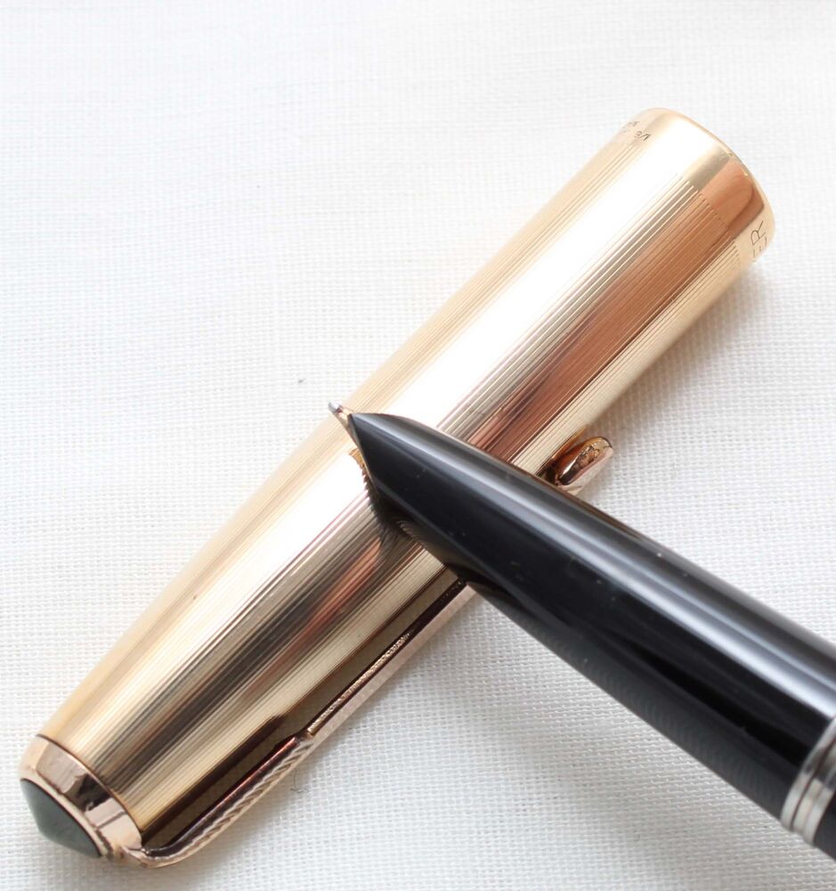 5423M Parker 51 Aerometric in Black with a Rolled Gold Cap. Fine FIVE STAR Nib.