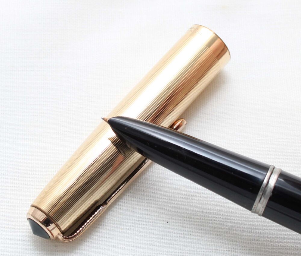 5424M Parker 51 Aerometric in Black with a Rolled Gold Cap. Fine FIVE STAR Nib.
