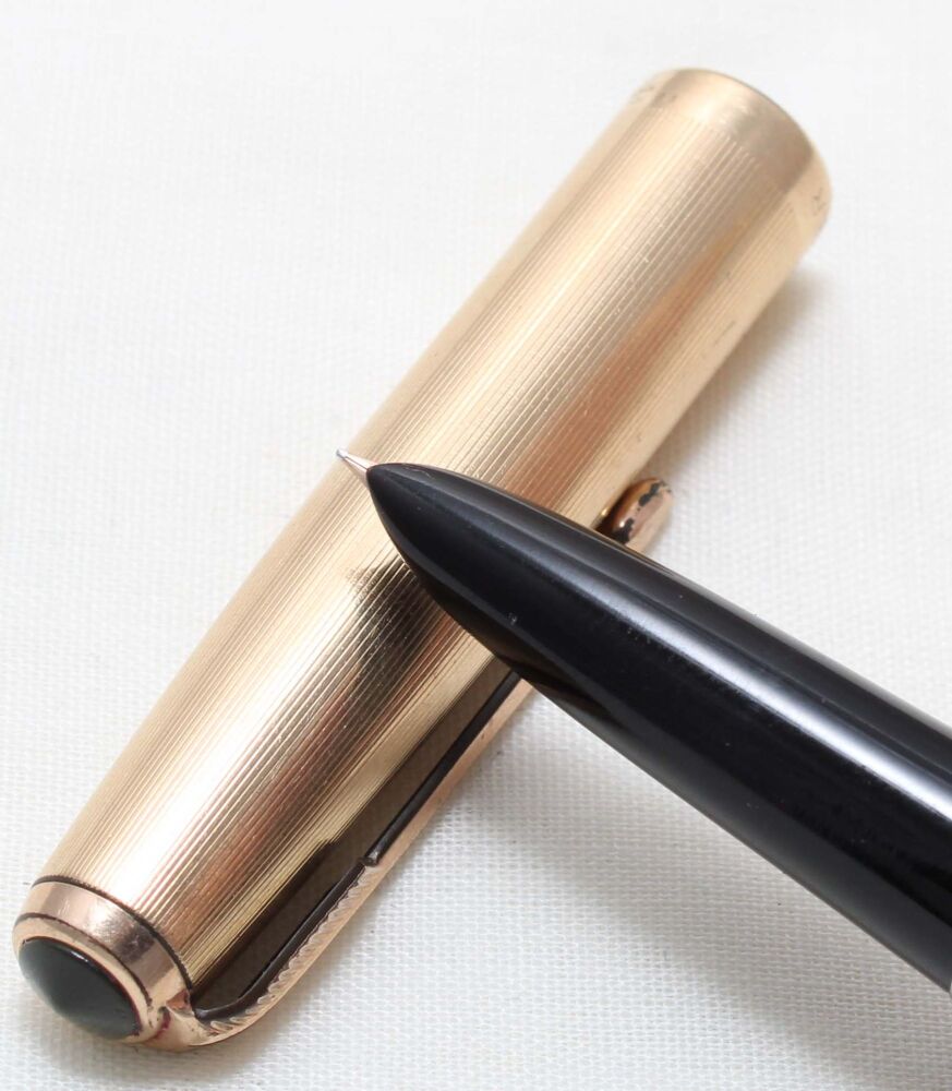 5470 Parker 51 Aerometric in Black with a Rolled Gold Cap. Extra Fine FIVE STAR Nib.