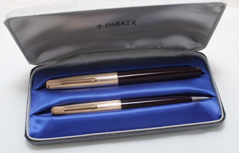 5560 Parker 51 Double Set in Dark Burgundy with Rolled Gold Caps. Fine FIVE STAR Nib. Mint and Boxed.