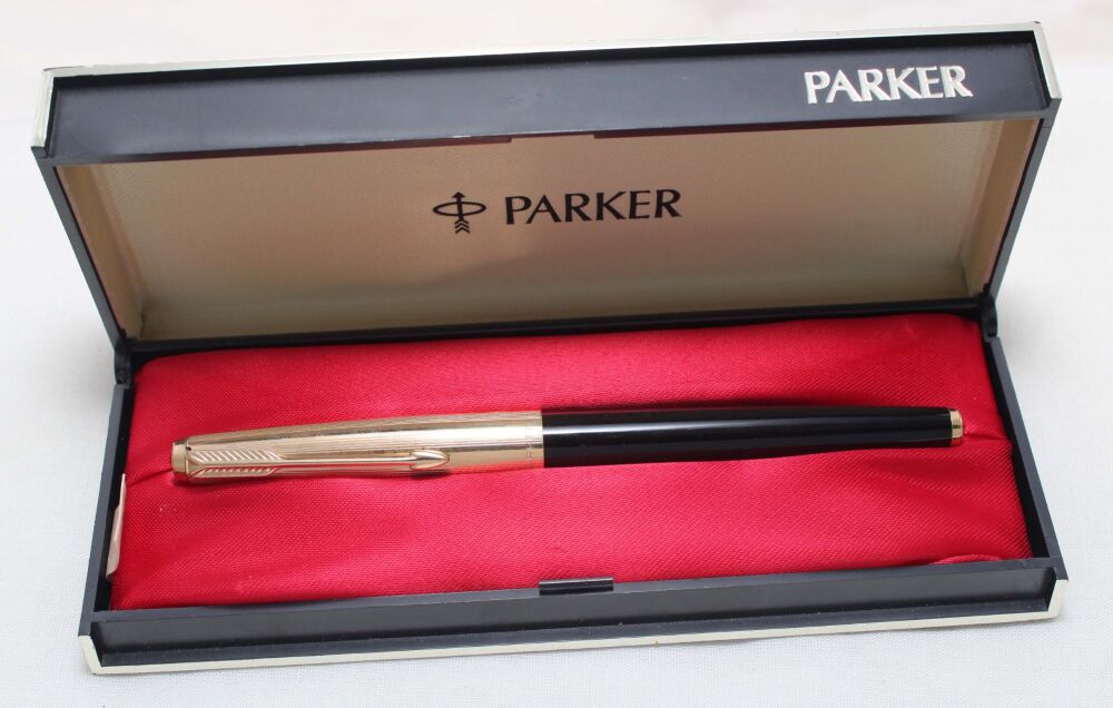 5565 Parker 65 Custom in Black with a Rolled Gold Cap. Medium FIVE STAR Nib. Mint and Boxed.