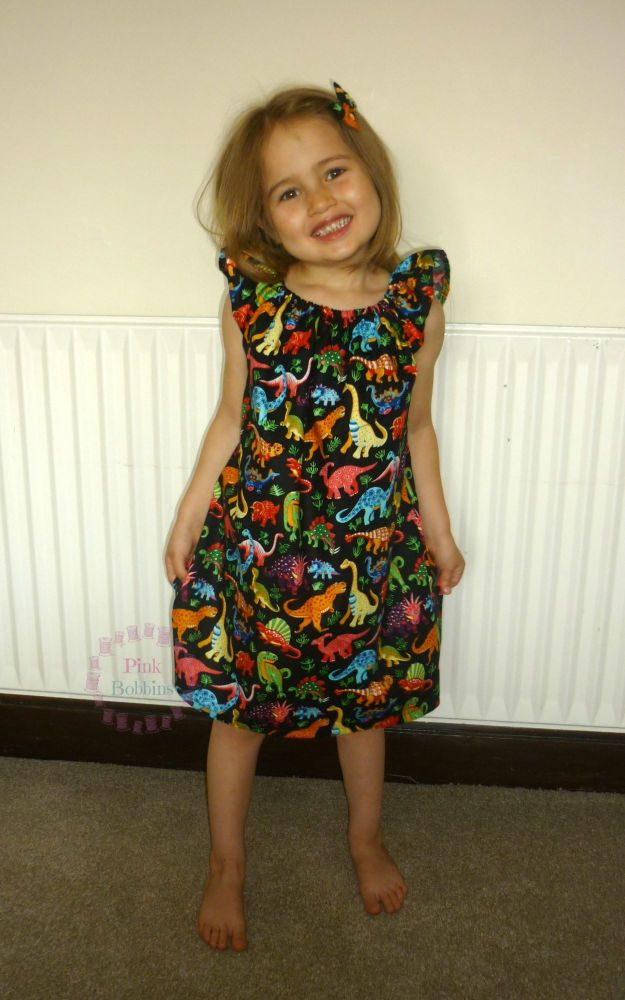 Black dinosaur angel sleeve dress