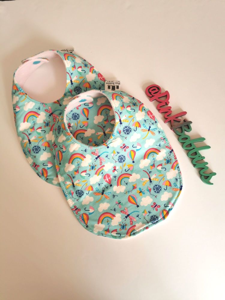 Rainbows & hot air balloons rounded bib - in stock 