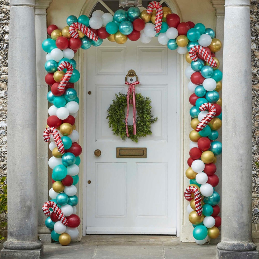 christmas balloon arch, balloon arch with candy canes, christmas door arch