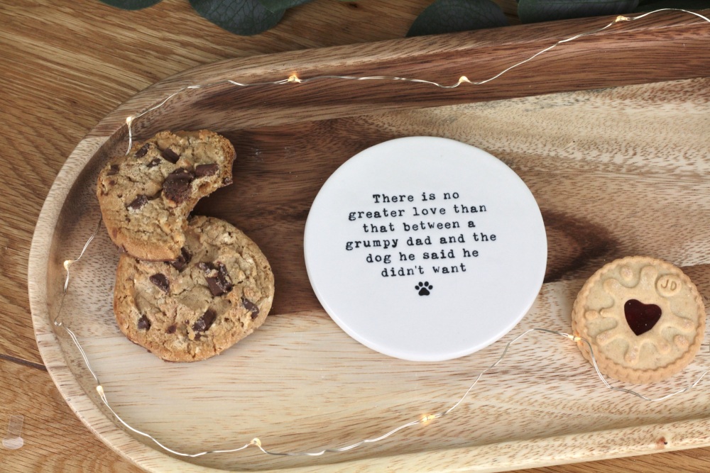 No greater love between a grumpy dad and a dog he didn't want Ceramic Coaster