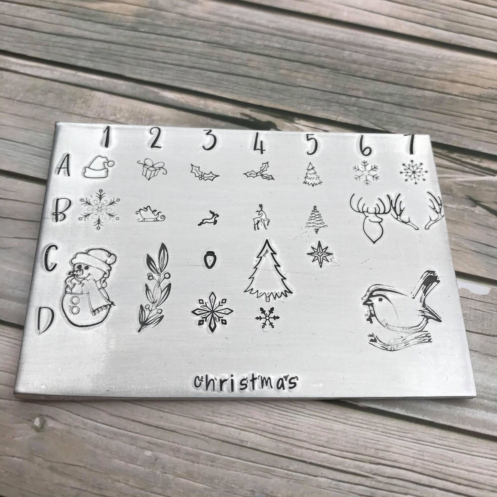 Christmas themed metal design stamps