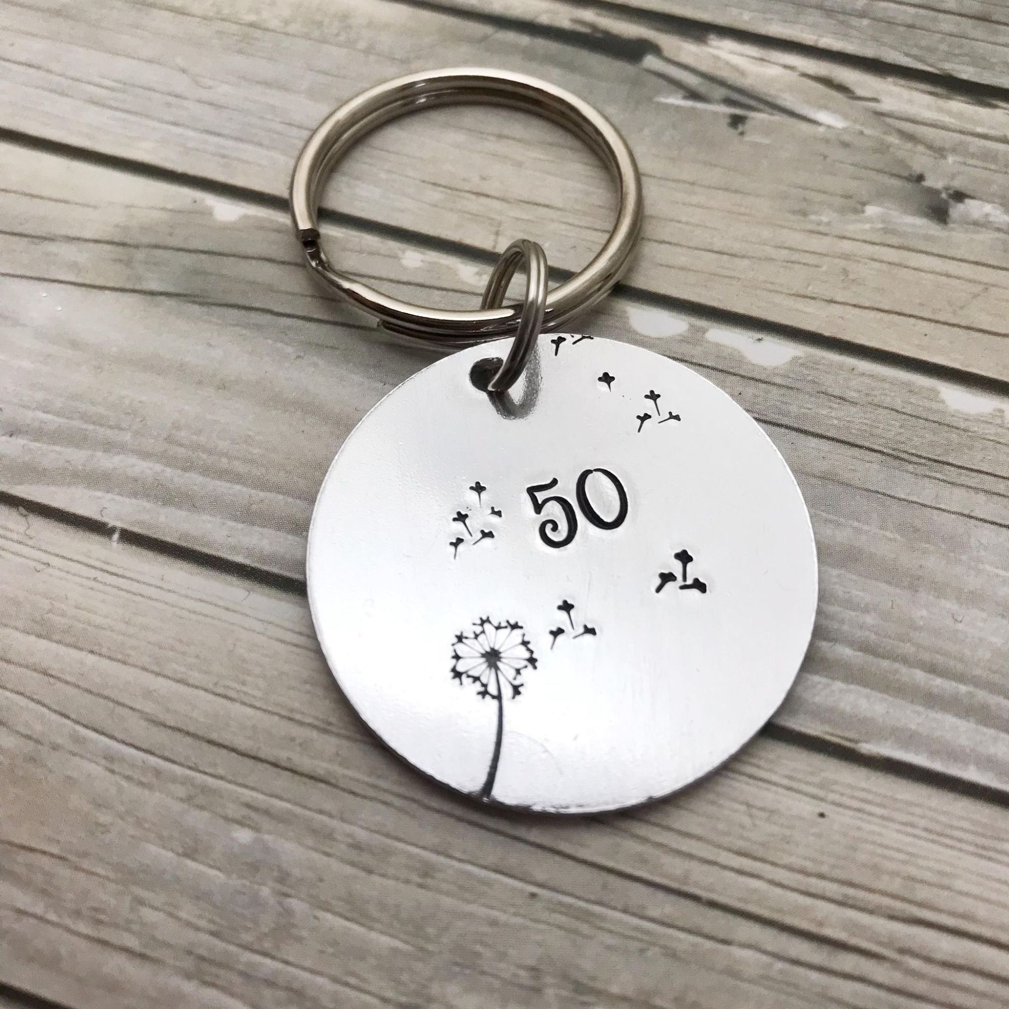 keyring hand stamped with dandelion and 50