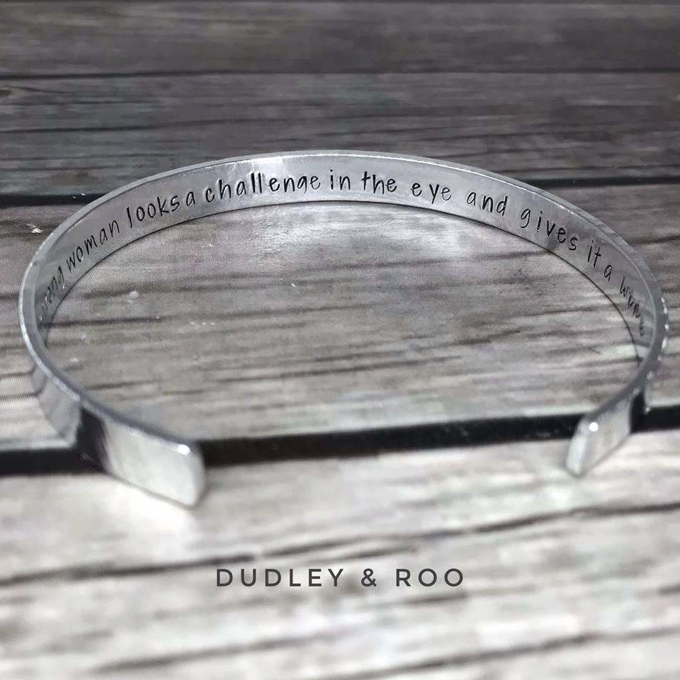 silver coloured cuff bangle hand stamped with personalised quote