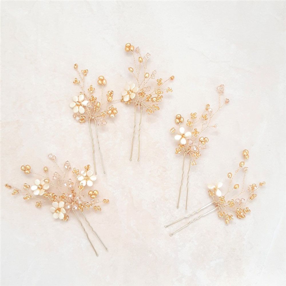 1-ac-3-Esme 2- A mixed size collection of topaz hair pins