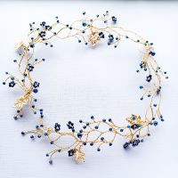An intense navy blue occasion-wedding headpiece with Autumnal maple leaves-0A-BBS-Leisle