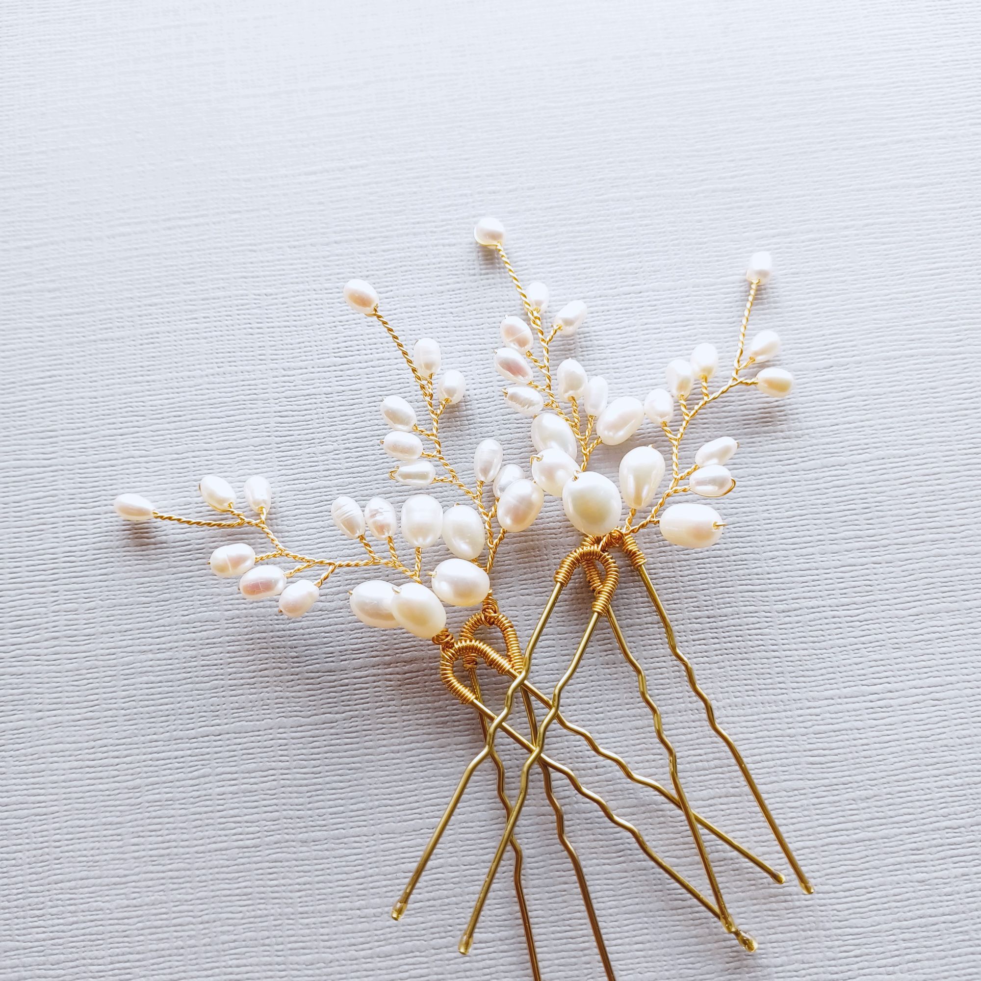 White bridal hairpins custom made by Beady Bride UK