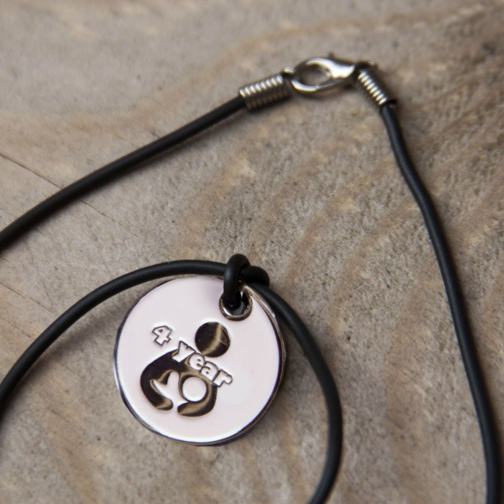 4 year Token with Black Cord Necklace