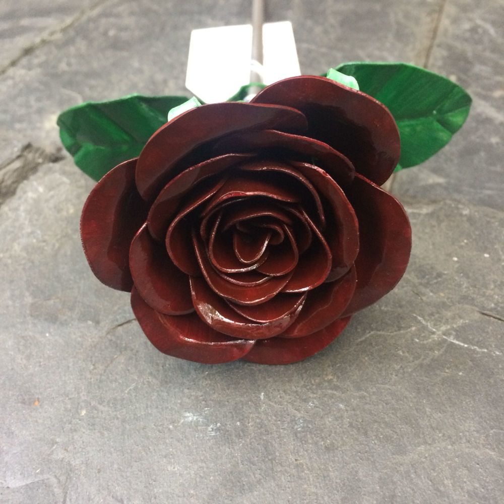 Dark burgundy steel metal rose
