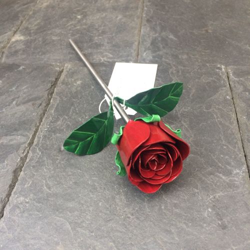 Metal flower, steel rose in dark red