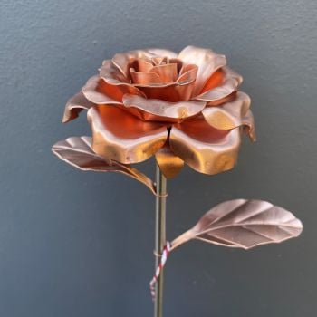 Copper metal rose on a steel stem with copper leaves WM980
