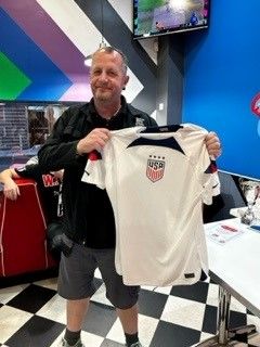 Trevor and a Team USA football shirt