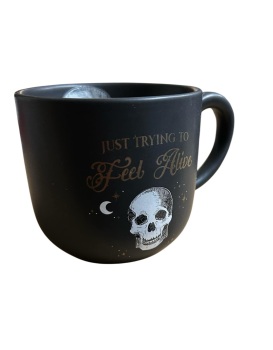 “Just trying to stay alive” mug