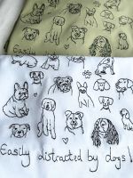 <!-- 001 --> Lots of dogs  - Organic Embroidered Tee