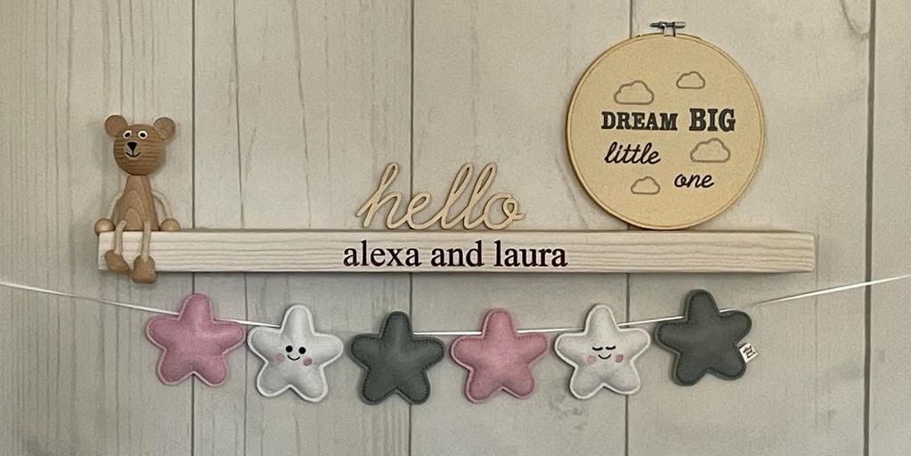Stuffed Felt 6 Star Name Garland in Baby Pink, Grey and White with Faces.