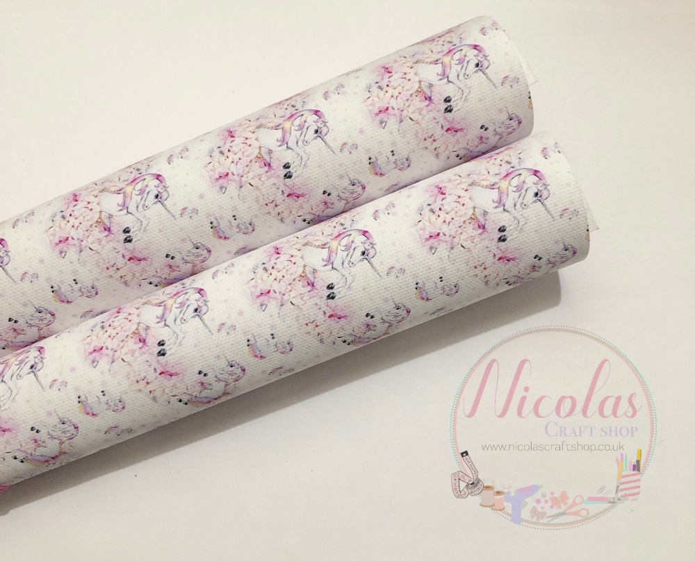 1058 - Stunning white/pink Falling unicorn printed canvas fabric