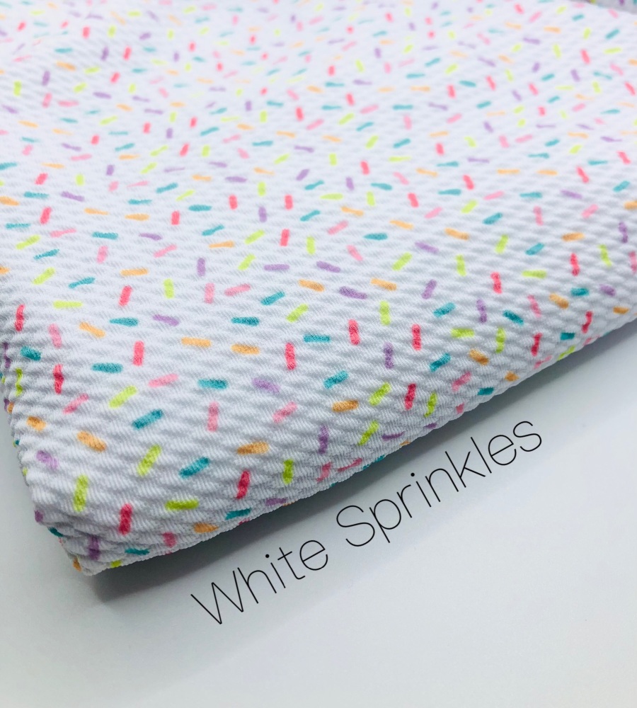 White Sprinkles Printed Bullet Fabric
